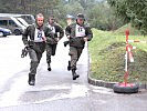 Beim Mannschaftsbewerb muss vor dem Schießen eine Laufstrecke von 200 Metern zurückgelegt werden.