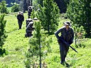 Ein Trainingsszenario: Der Aufklärungszug sichert die Flanke der angreifenden Kompanie.