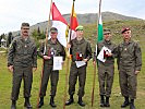 Brigadier Gitschthaler, r., mit den Siegern und Organisator Oberst Hubmann.