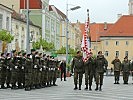 Der Einmarsch der Insignie.