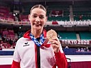 Bettina Plank mit ihrer Olympia-Bronzemedaille.