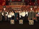 Die Heeressportlerinnen und Heeressportler mit Ministerin Tanner bei der Gala im Wiener Konzerthaus.