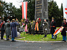 Gedenken beim Rainer-Obelisk.