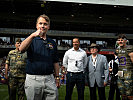 Coin Toss des US-Botschafters Wien, Arthur Graham Fisher.