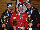 Überglücklich: Weltmeister Romed Baumann, Mitte, und Michael Gufler, l. (Bild öffnet sich in einem neuen Fenster)