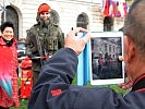 Die Wachsoldaten der Garde sind beliebte Fotomotive... (Bild öffnet sich in einem neuen Fenster)