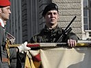 An der Insignie. (Bild öffnet sich in einem neuen Fenster)