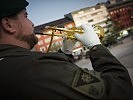 Signal des Solotrompeters zum Einmarsch. (Bild öffnet sich in einem neuen Fenster)